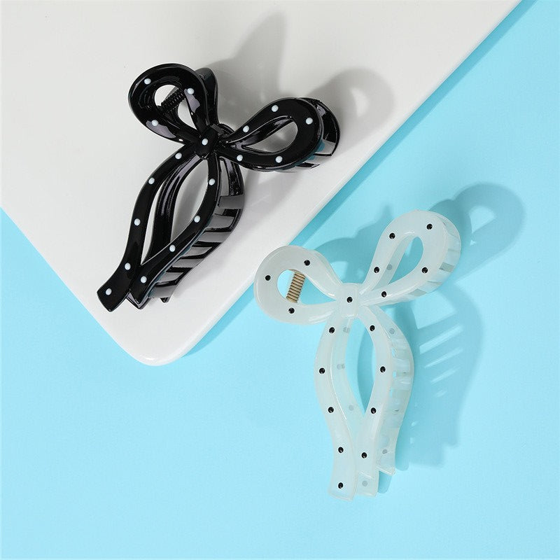 Polka dot bow claw clip