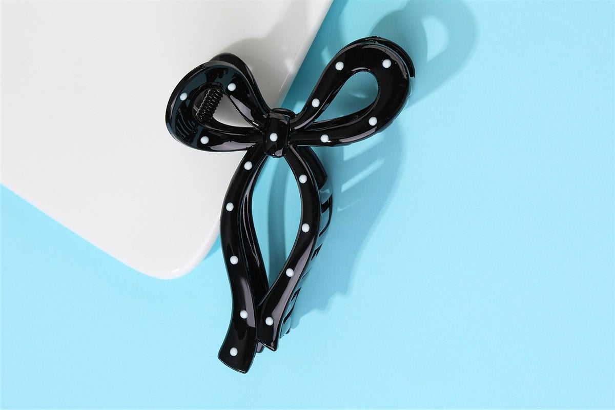 Polka dot bow claw clip